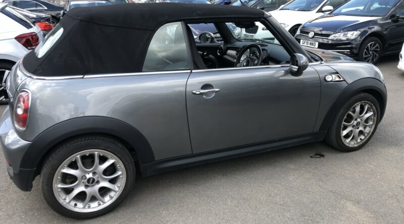 What classifies a three-door car?